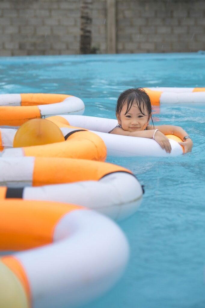 young girl swimming